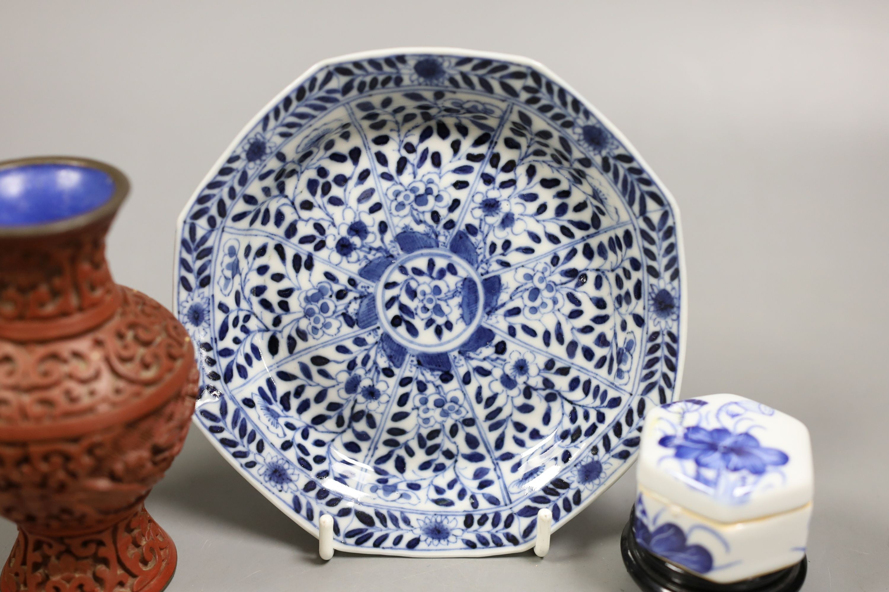 A Chinese Kangxi style octagonal dish, a Chinese cinnabar lacquer vase and a blue and white box, Dish 12.5 cms.